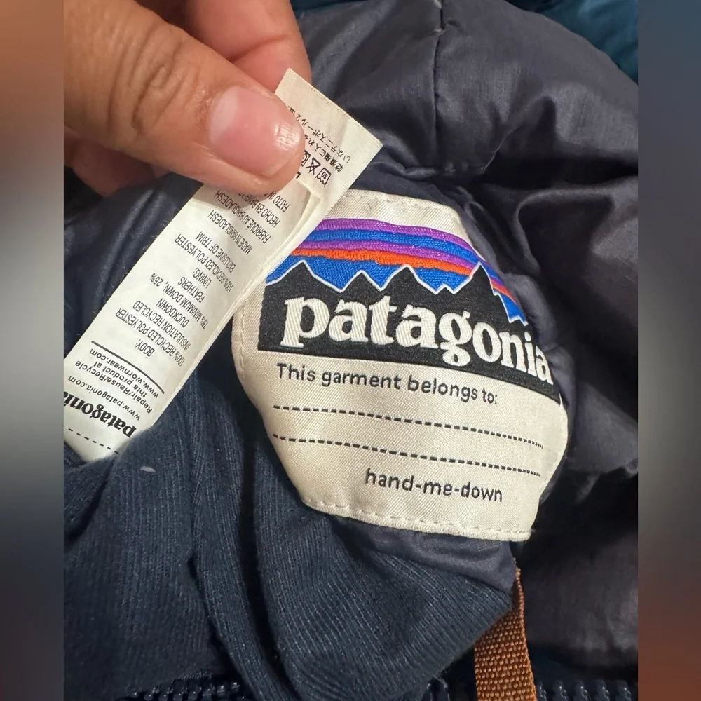 Patagonia Blue and Brown Puffer Jacket with Geometric Design